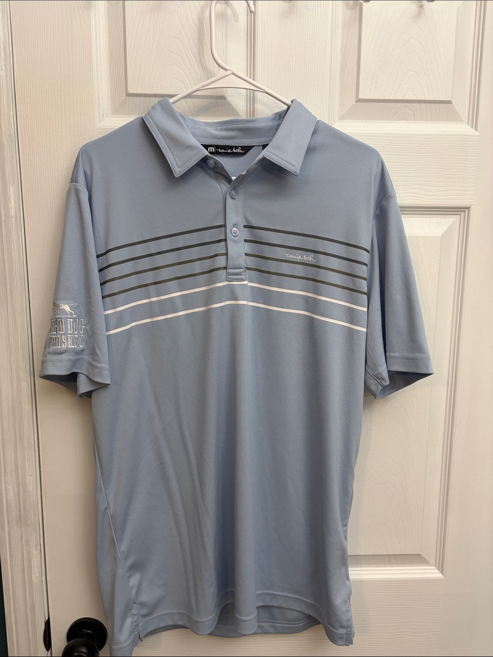Travis Mathew Sky Blue Polo with Gray and White Chest Stripes